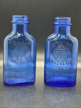 Vintage Antique Cobalt Blue pair Milk of Magnesia Bottles Chas. H. Phillips Co.